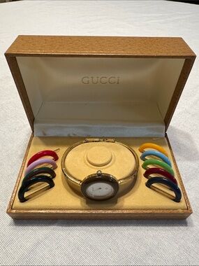 Gucci Vintage Gold Tone Bangle Watch, White Dial, with Multicolor Bezels
